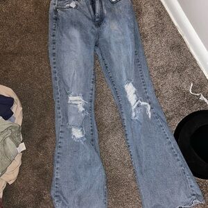 Distressed Blue Denim Jeans